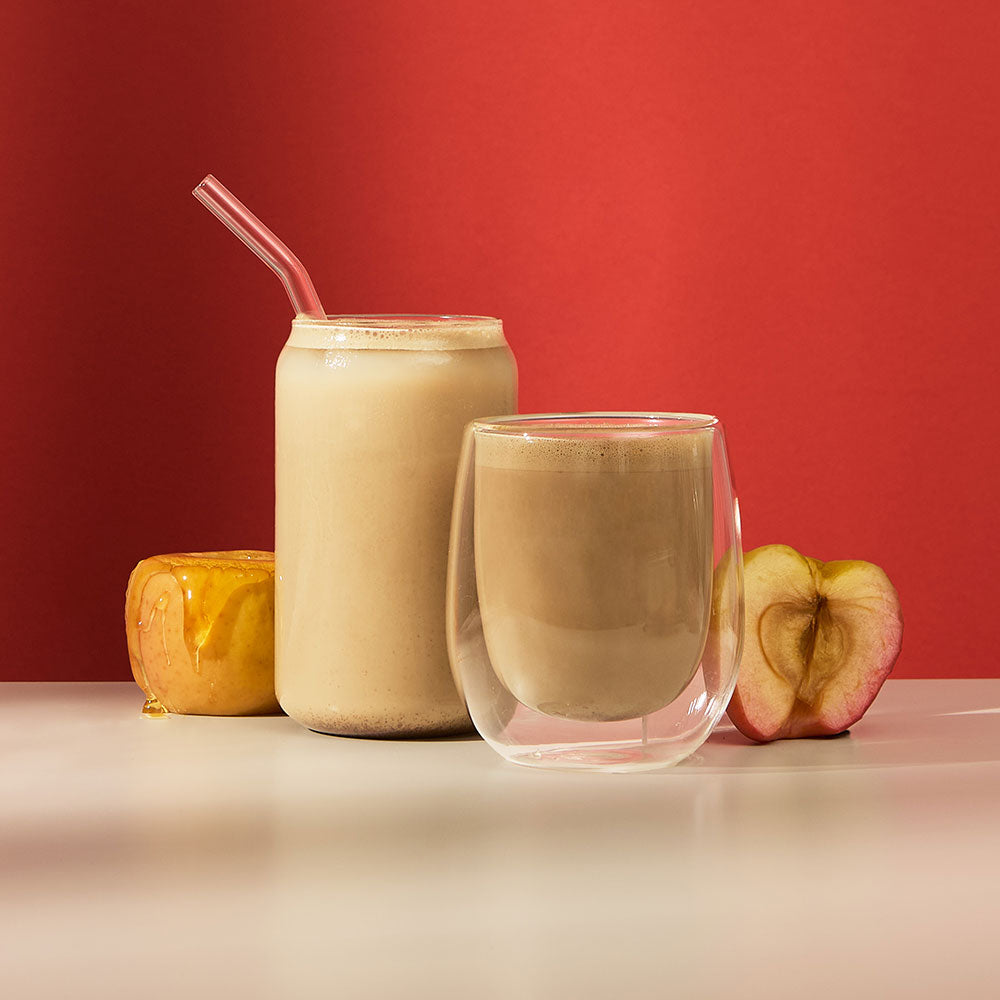 baked apple hojicha tea powder latte hot & iced with apple covered in maple syrup