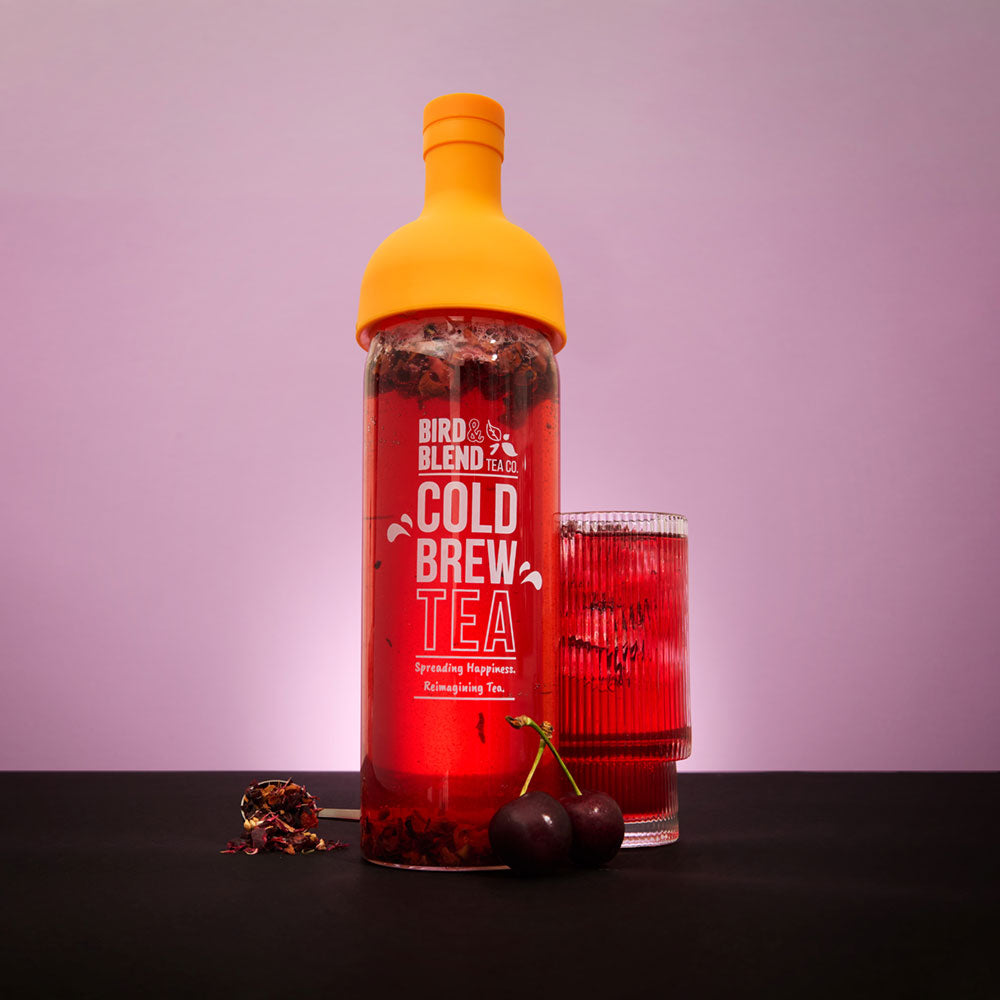 cherrified cold brew cherry tea in orange cold brew bottle