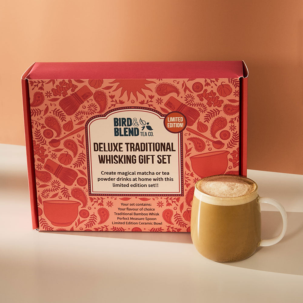 Deluxe whisking tea powder & matcha gift set closed with a hot chai latte