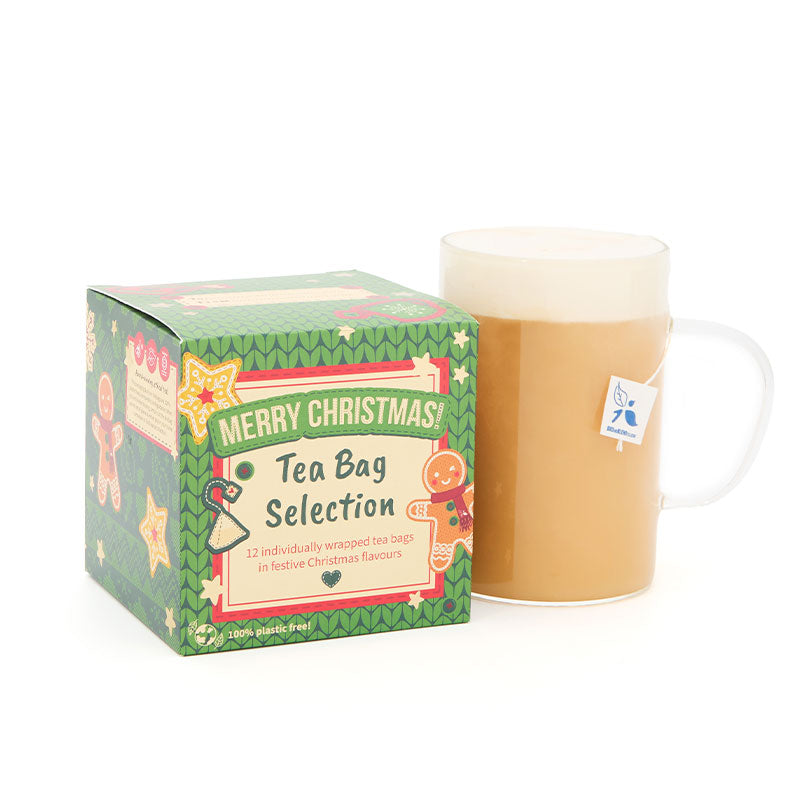 green christmas cube with hot tea