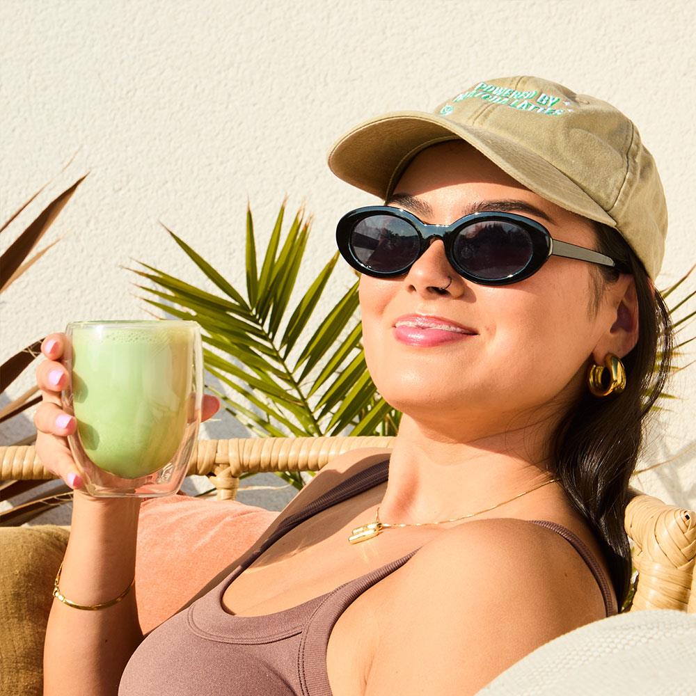 matcha cap worn in the sunshine