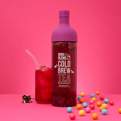 bubblegum pop! tea in plum purple cold brew tea bottle and spoon and iced tea