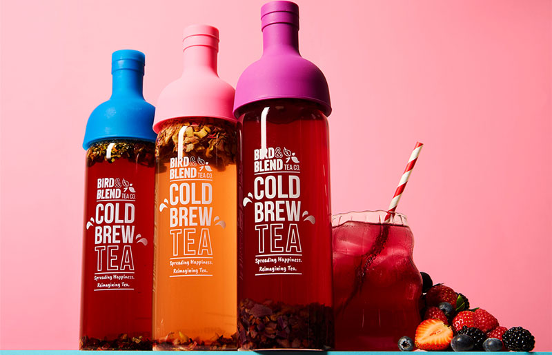  peachy pink plum purple & sapphire blue cold brew tea bottle filled with tea & iced tea 