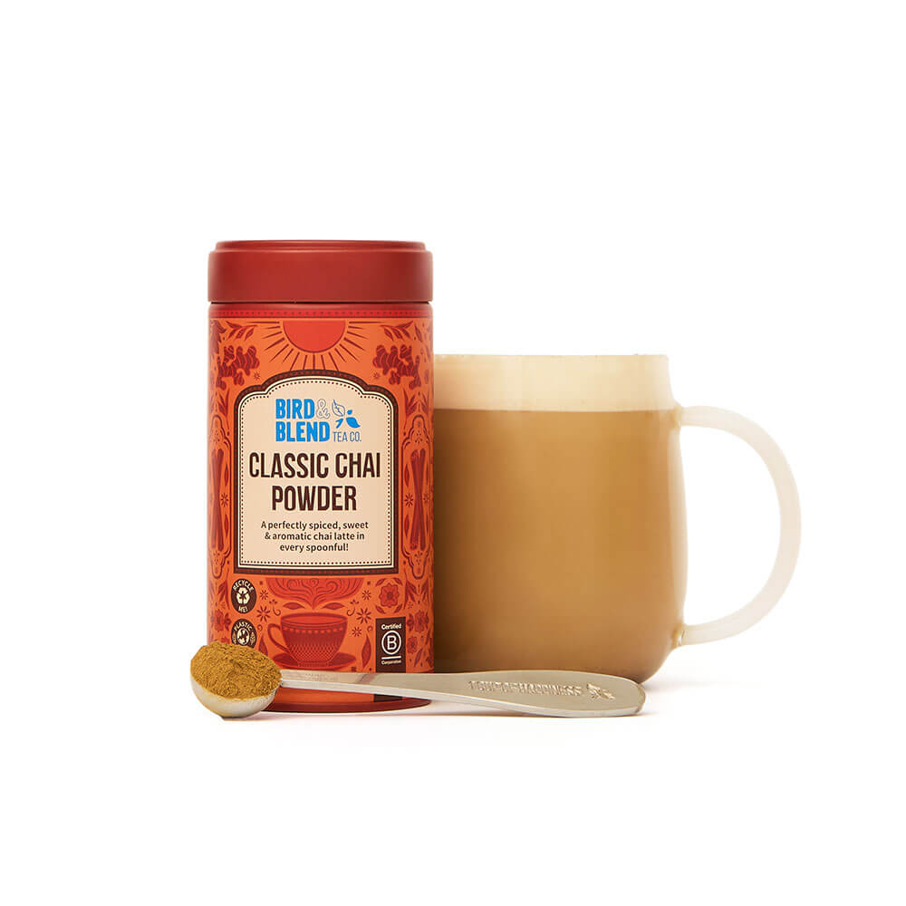 classic chai tea powder tin spoon &amp; hot chai latte