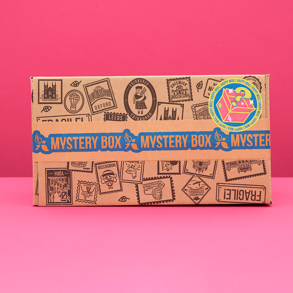 close up of the mystery tea box with pink background