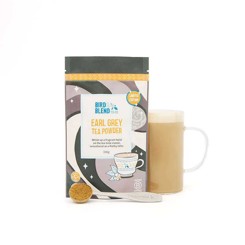 Earl grey tea powder pouch and spoon and hot tea latte