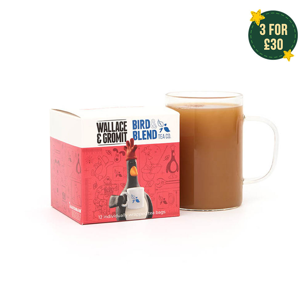 feathers cube with hot cup of tea