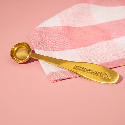 1 cup of happiness gold matcha tea spoon