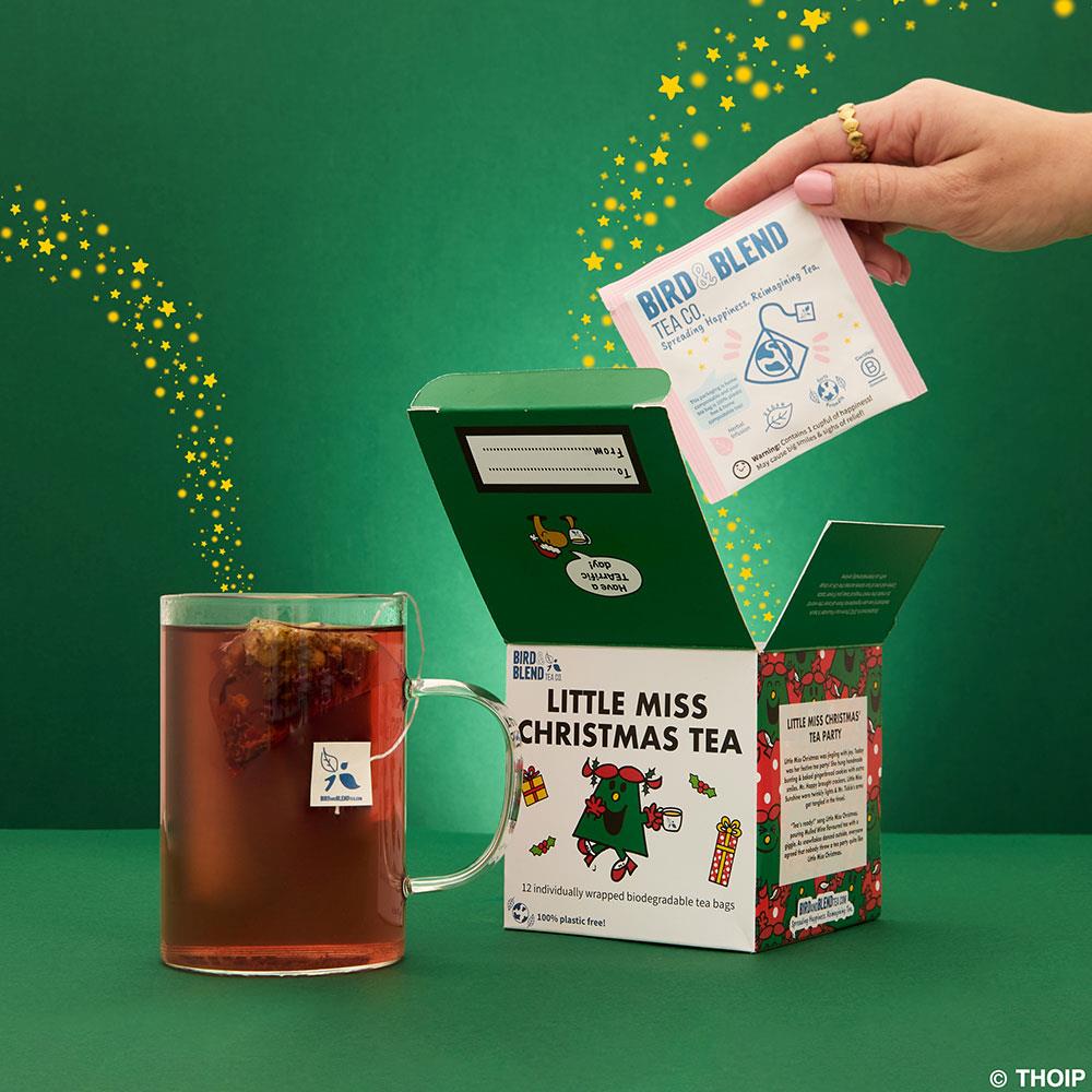 little miss christmas cube open with hot tea