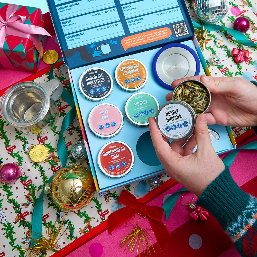 Loose leaf selection box open showing tins of tea