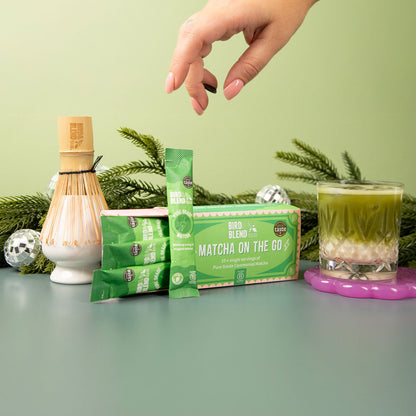 matcha on the go pure grade ceremonial matcha sticks in box and bamboo whisk on chasen