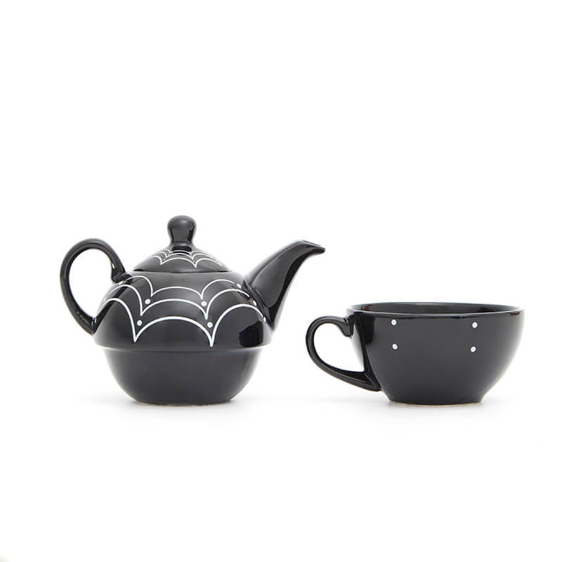 spooky tea pot and cup